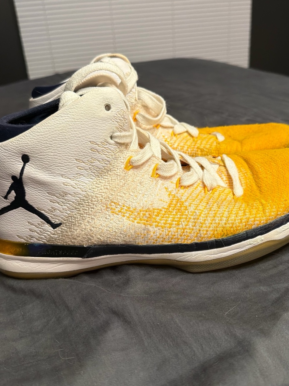 Jordan’s ' Yellow and White High-Top Sneakers with Black Jumpman